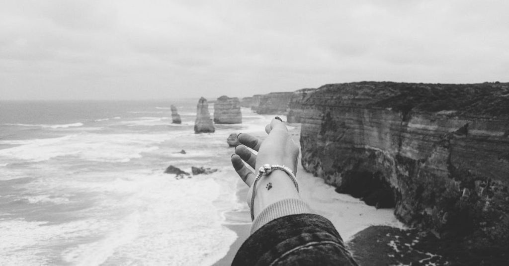 Black and white photo of the iconic Twelve Apostles along the Great Ocean Road.