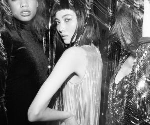 Stylish portraits of fashionable women at a lively party in monochrome.